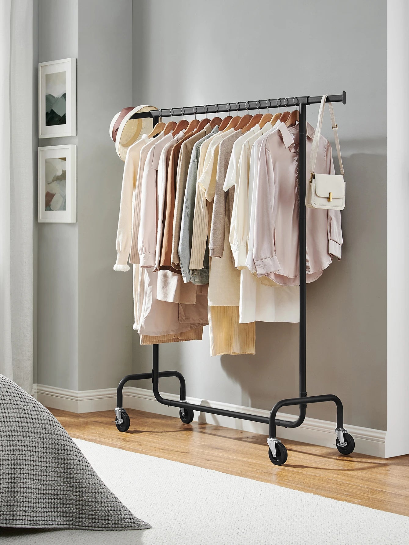 SONGMICS Heavy-Duty Clothes Rack on Wheels